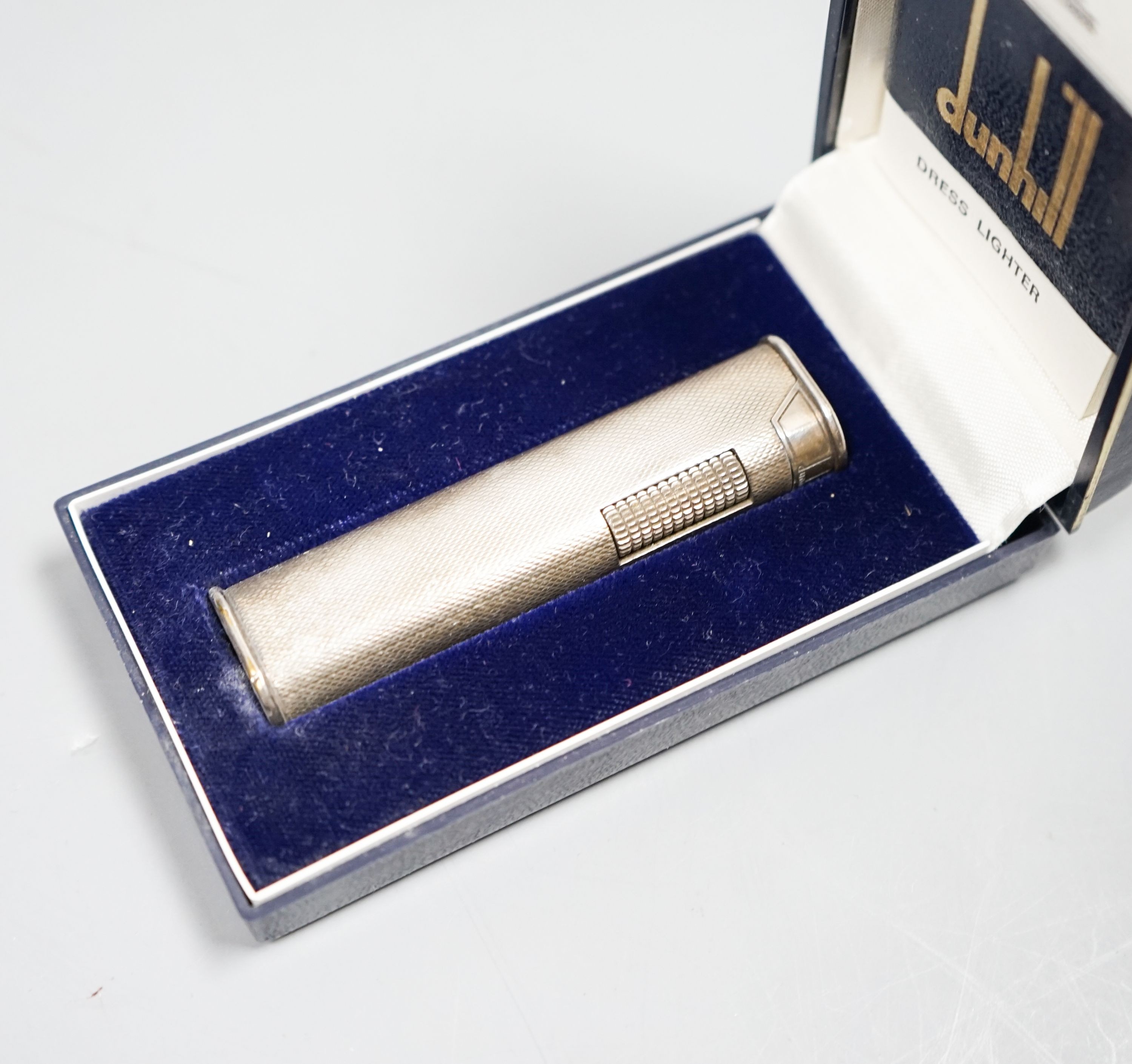 A Dunhill cigarette lighter, in case